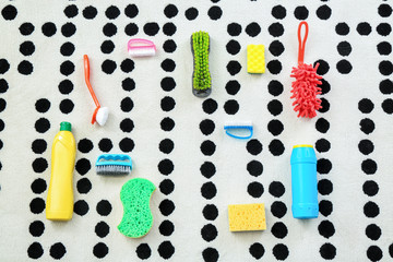 Cleaning supplies on soft carpet