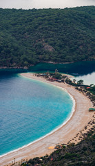 Oludeniz Beach and Blue Lagoon, Fethiye, Mugla, Turkey. Amazing Oludeniz beach landscape. Summer and holiday concept. Landscape from Lycian way.