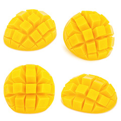 Carved mangoes isolated on a white background.
