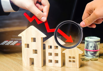The concept of falling real estate market. Reduced interest in the mortgage. A decline in property...