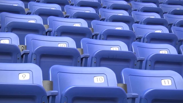 Blue empty seats at the hockey stadium