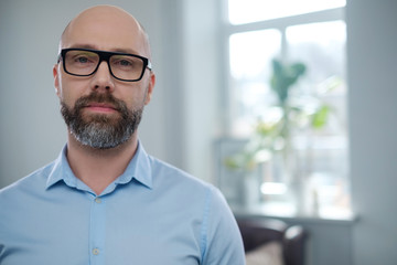 Fototapeta premium Bearded middle-aged man wearing glasses.