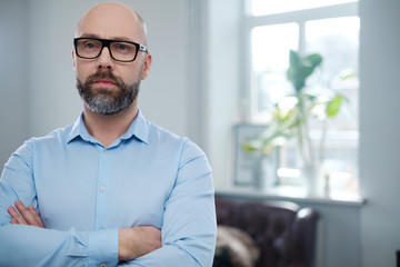Fototapeta premium Bearded middle-aged man wearing glasses.