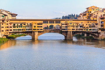 Obraz premium Ponte Vecchio bridge in Florence at sunset, Italy