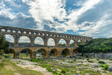 Roman aqueduct Pont du Gard, Unesco site.Languedoc, France. - obrazy, fototapety, plakaty