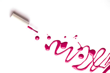 nail polish bottle and drop on white background