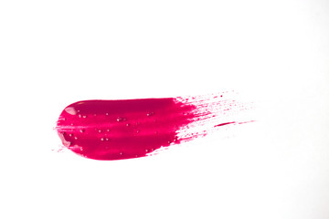 close up of nail polish stroke on white background