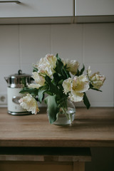 Yellow papagei tulip bouquet in the kitchen, lifestyle picture, Springtime