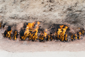 Baku, Azerbaijan - Jul 31 2018: Yanar Dag in Baku, Azerbaijan. Yanar Dag is a natural gas fire which blazes continuously on a hillside.