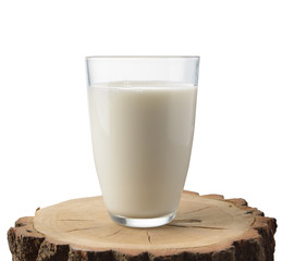 Glass of milk on stump
