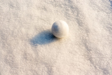 Fototapeta na wymiar round snow lies on the snow