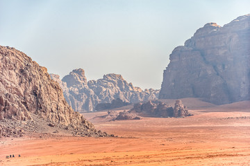 .incredible lunar landscape in Wadi Rum in the Jordanian red sand desert. Wadi Rum also known as The Valley of the Moon,  Jordan - Image