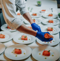chef preparing food for dinner service
