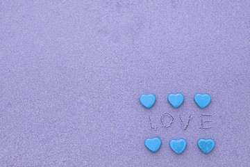 Chocolate color Lovely Blue heart on the beach. Background is a natural in real place, creative Valentine's Day Concept, tropical style background made in Phuket, Thailand.