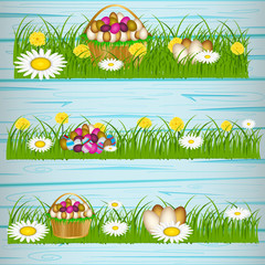 Easter eggs on the green grass. Seasonal holidays in April. Colorful egg and flowers.Banner