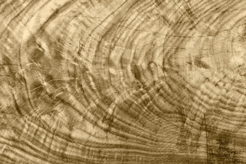 Naklejka premium The abstract natural slab wood texture of the background. The creative concept of ecological nature. Background mahogany pattern.