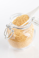 amaranth beans in spoon and glass bowl