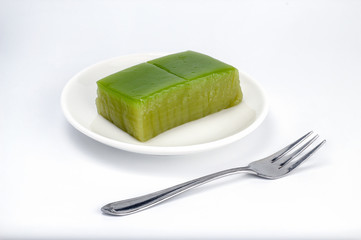 Thai tradition dessert layer sweets cake, Thai Sweet multi layer sweet cake name is Kanom Chan isolate on white background