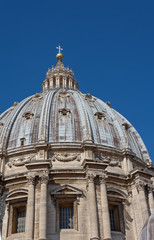 Fototapeta na wymiar ROME, ITALY - march, 2019: Close up of the Dome (cupola) of The Papal Basilica of St. Peter (San Pietro) in Vatican City Rome, designed by Michelangelo . It is the tallest dome in the world.