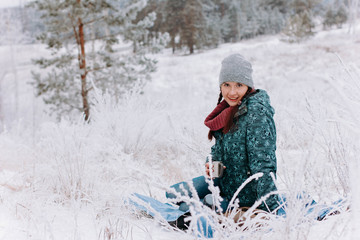Fototapeta na wymiar girl in the snow