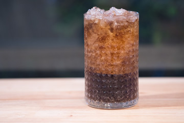 A fresh glass of soft drink with ice