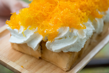 Toast with cream and gold egg yolks thread (Foythong)