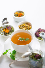 cup of herbal tea, white background