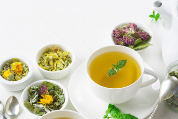 cup of herbal tea, white background