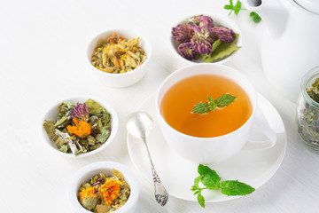 cup of herbal tea, white background