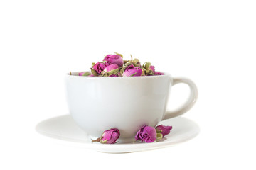 Cup of roses tea with rose