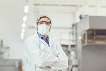 Chemist man in mask at work