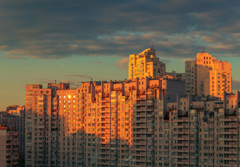 Fototapeta na wymiar Modern city buildings in sunset light.
