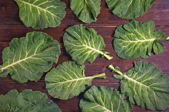 Rastan ( Collard Greens, Collards ) - Popular Leafy Vegetables In Balkan Cuisine.  Dark Rustic Background, Flat Lay