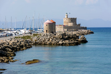 island of Rhodes, Greece, old mill yacht in the Bay of the Mediterranean sea