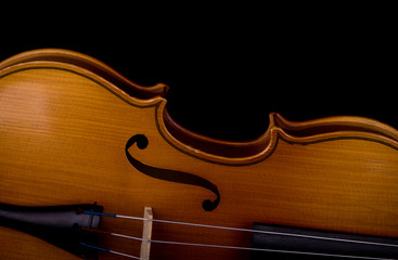 Violin music instrument closeup isolated on black