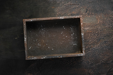 Old Wooden box on Wooden background. Top view. Free copy space.