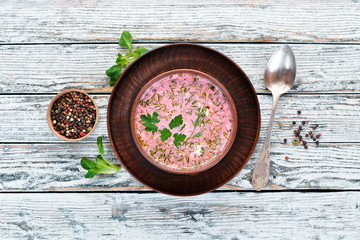 Red Borsch with beets. Ukrainian cuisine. Top view. Free space for your text. Rustic style.