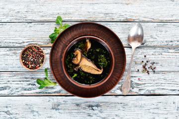 Mushroom Soup. Ukrainian cuisine. Top view. Free space for your text. Rustic style.