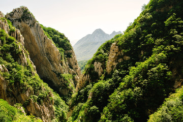 Trail and cliffs in Songshan Mountain, Dengfeng, China. Songshan is the tallest of the 5 sacred mountains - 259776692