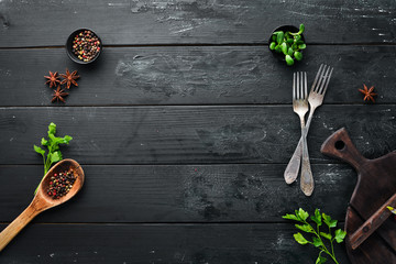 Cooking banner. Kitchen board, spices and cutlery. Top view. Free space for your text. Rustic style. - Powered by Adobe