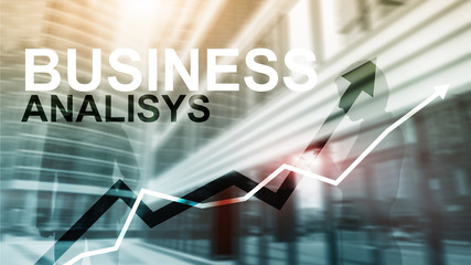 Business analysis diagrams and graphs on virtual screen. Financial and technology concept with blurred background.