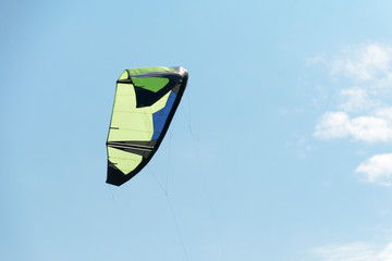 Kiteboarding kite close-up blue sky with clouds in background
