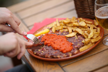 Traditional serbian grilled dish of spiced meat patty mixture of pork, beef