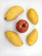 Apples and mango are collected from the farm, sold at vegetable shops.1