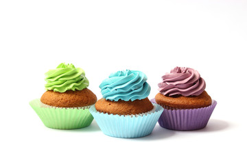 tasty cupcakes on a white background.