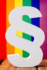 Paragraph symbol of law and justice with lgbt flag.