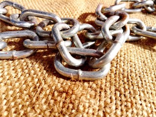 A chain is a serial assembly of connected pieces, called links, typically made of metal, with an...