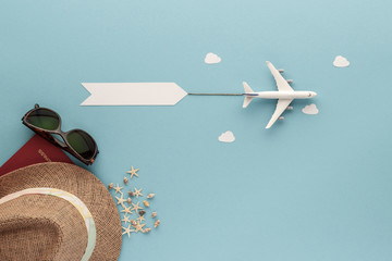 airplay clounds shell straw hat sunglasses passpotttop view with copy space for your text. flat...