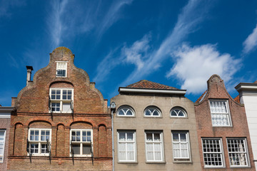 Fototapeta na wymiar stepped gable houses in Heusden, The Netherlands