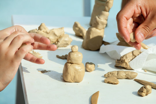 common children and teacher practices work studying sculpting art white clay